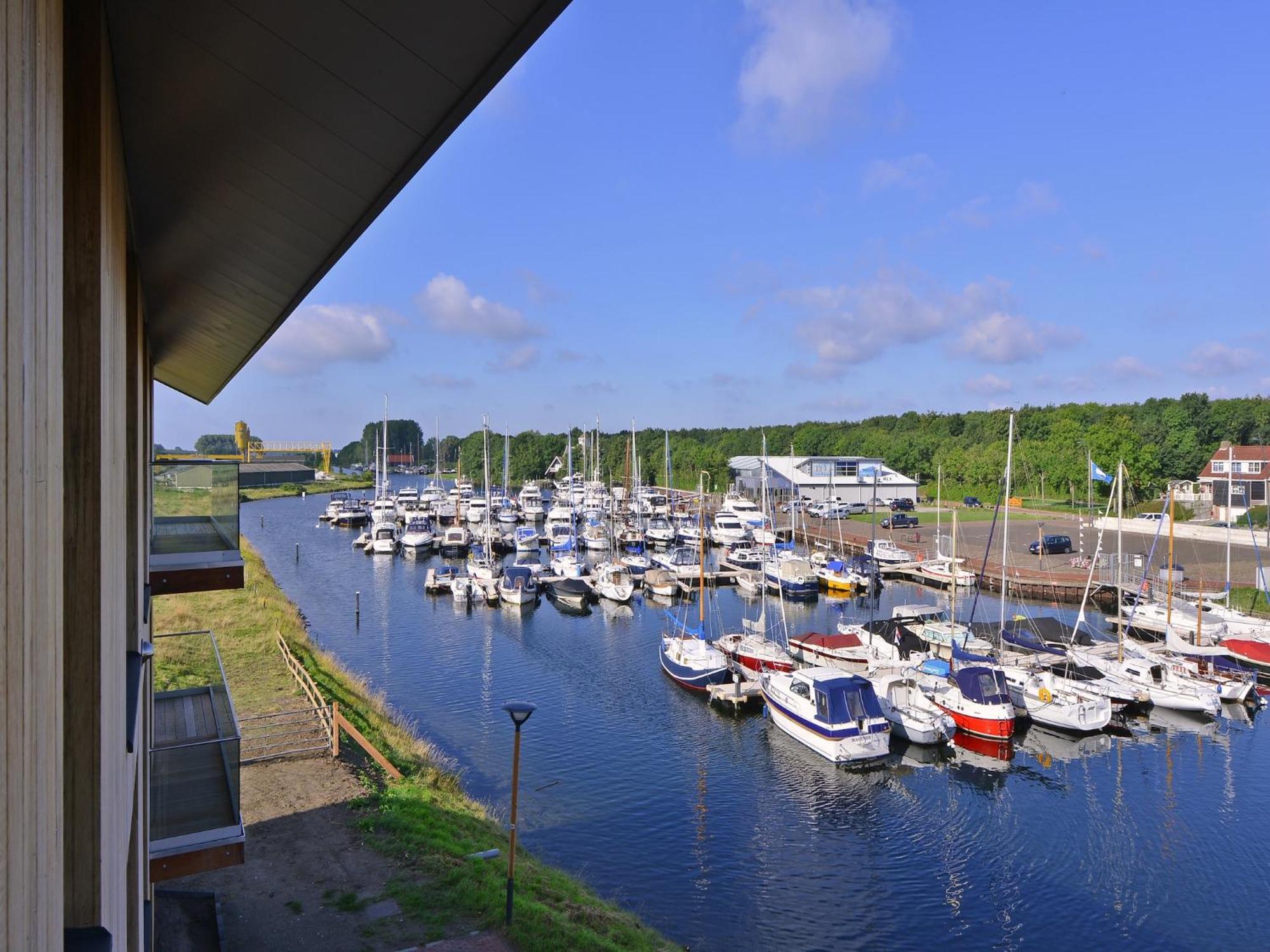 Waterlodge Blue Lagoon On A Jetty For 4 People Kamperland Exterior foto