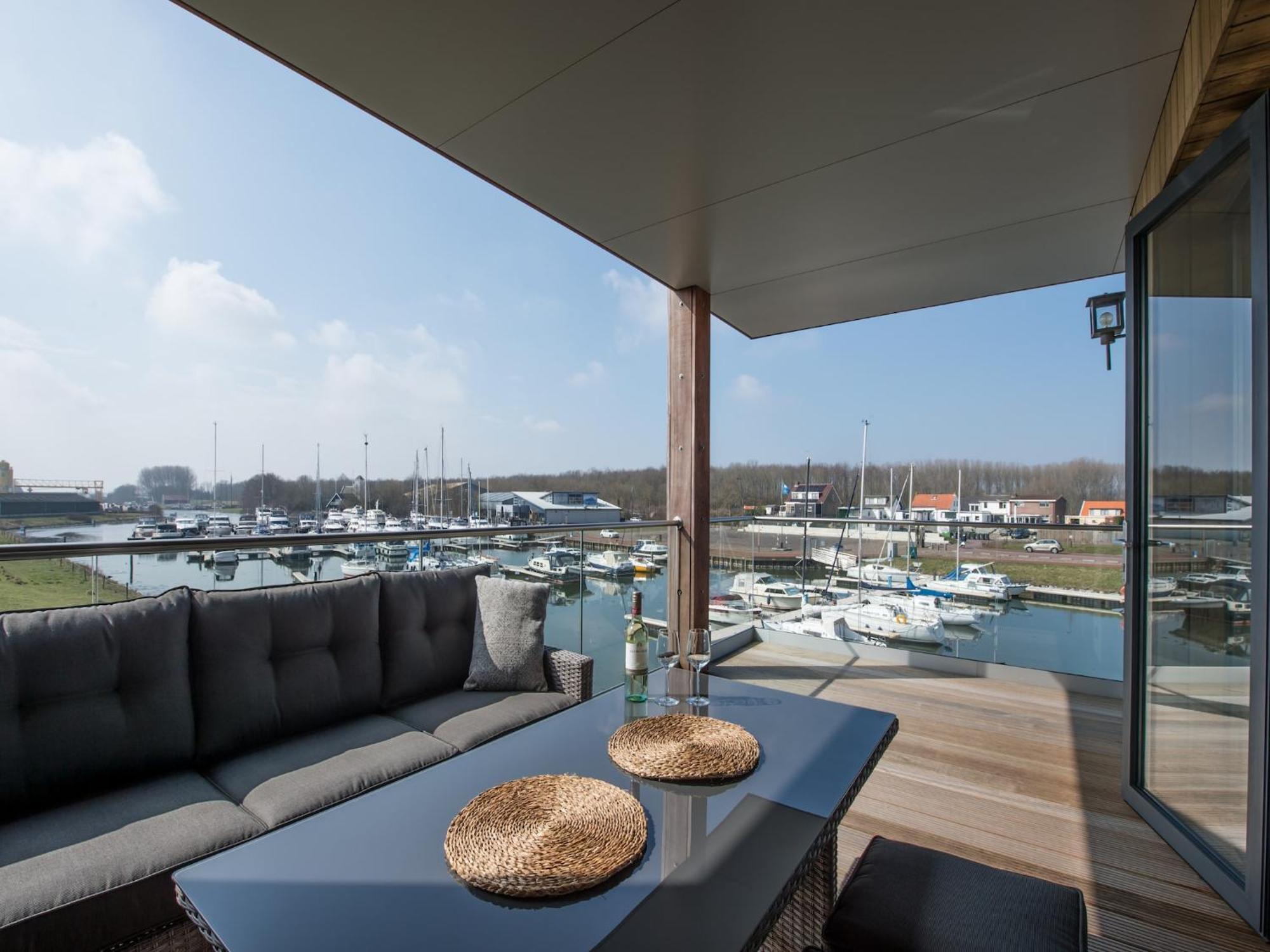 Waterlodge Blue Lagoon On A Jetty For 4 People Kamperland Exterior foto